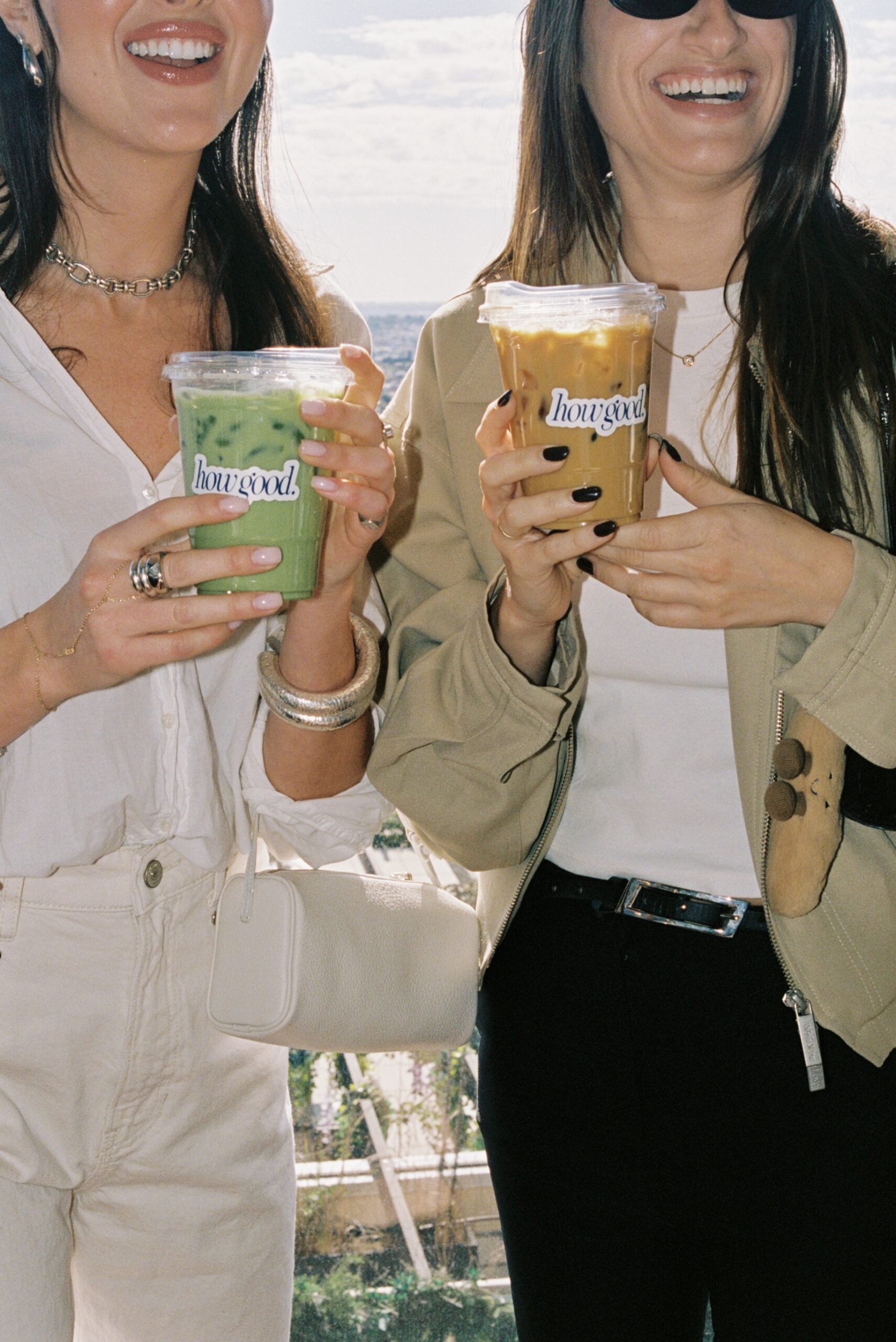 Friends drinking a latte and matcha made by coffee cart Messenger Coffee in Los Angeles