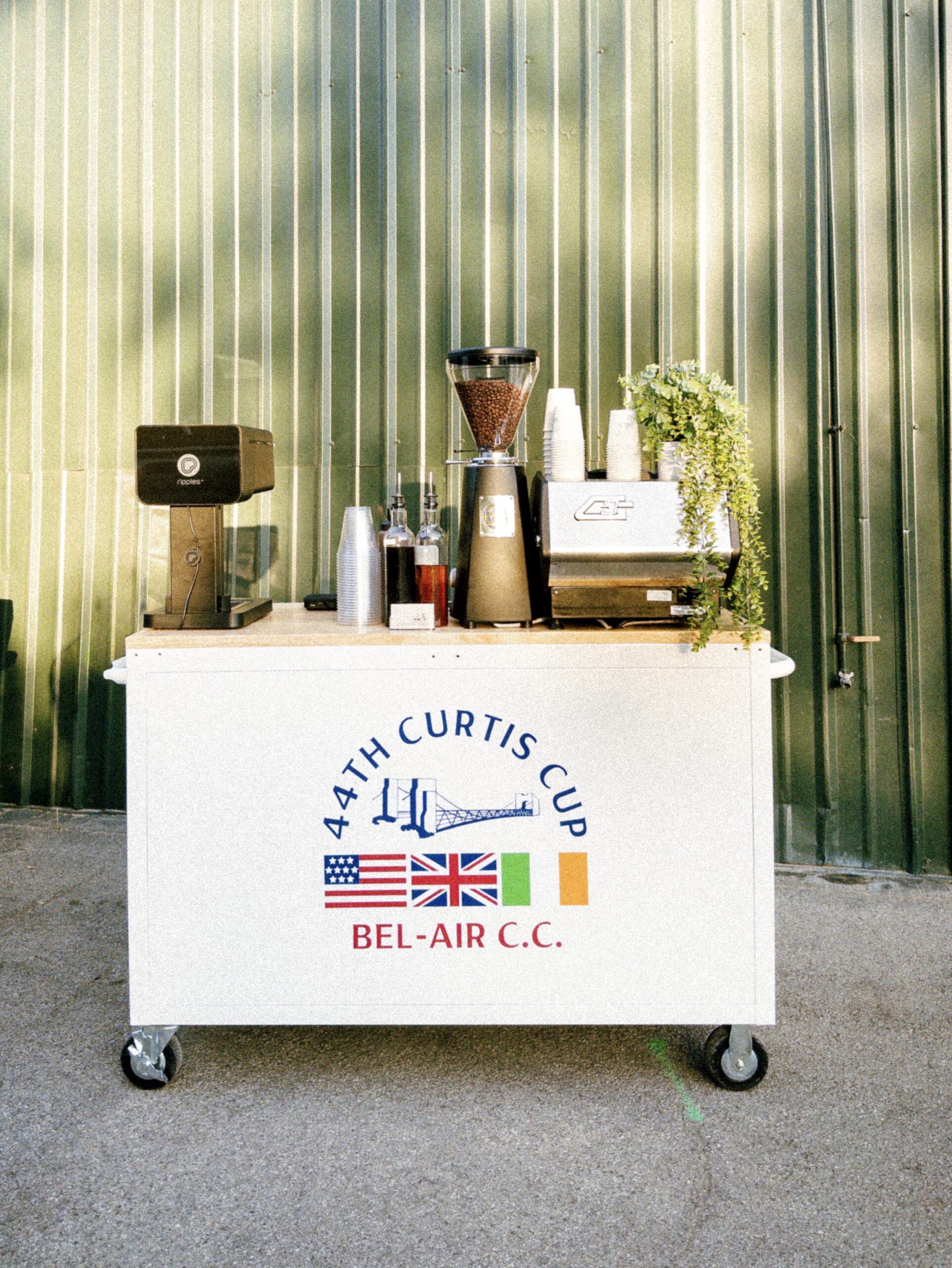 Custom branded coffee cart for an event in Los Angeles with a latte art printer serving hot and iced lattes and matcha