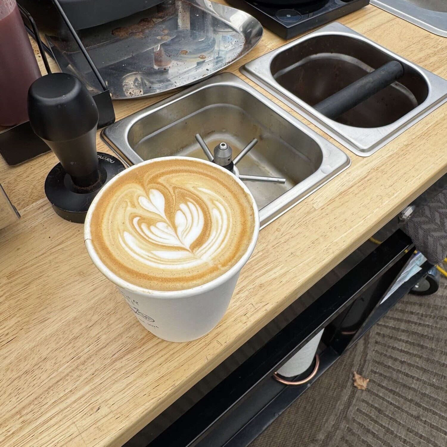 Latte art on a coffee cart by Messenger Coffee LA