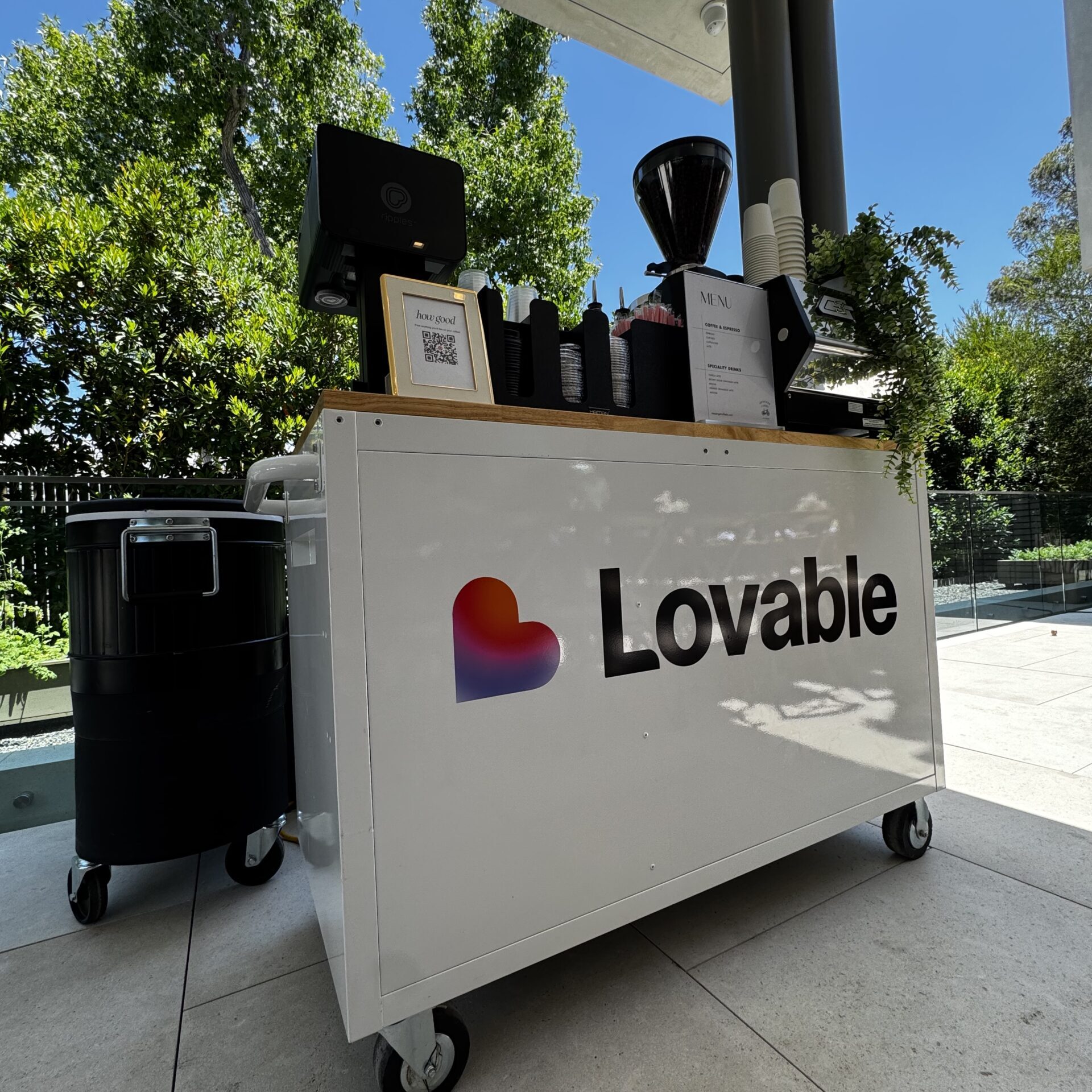 Custom branded coffee cart serving hot and iced lattes and matcha beverages with alternative milks for an influencer event in Beverly Hills